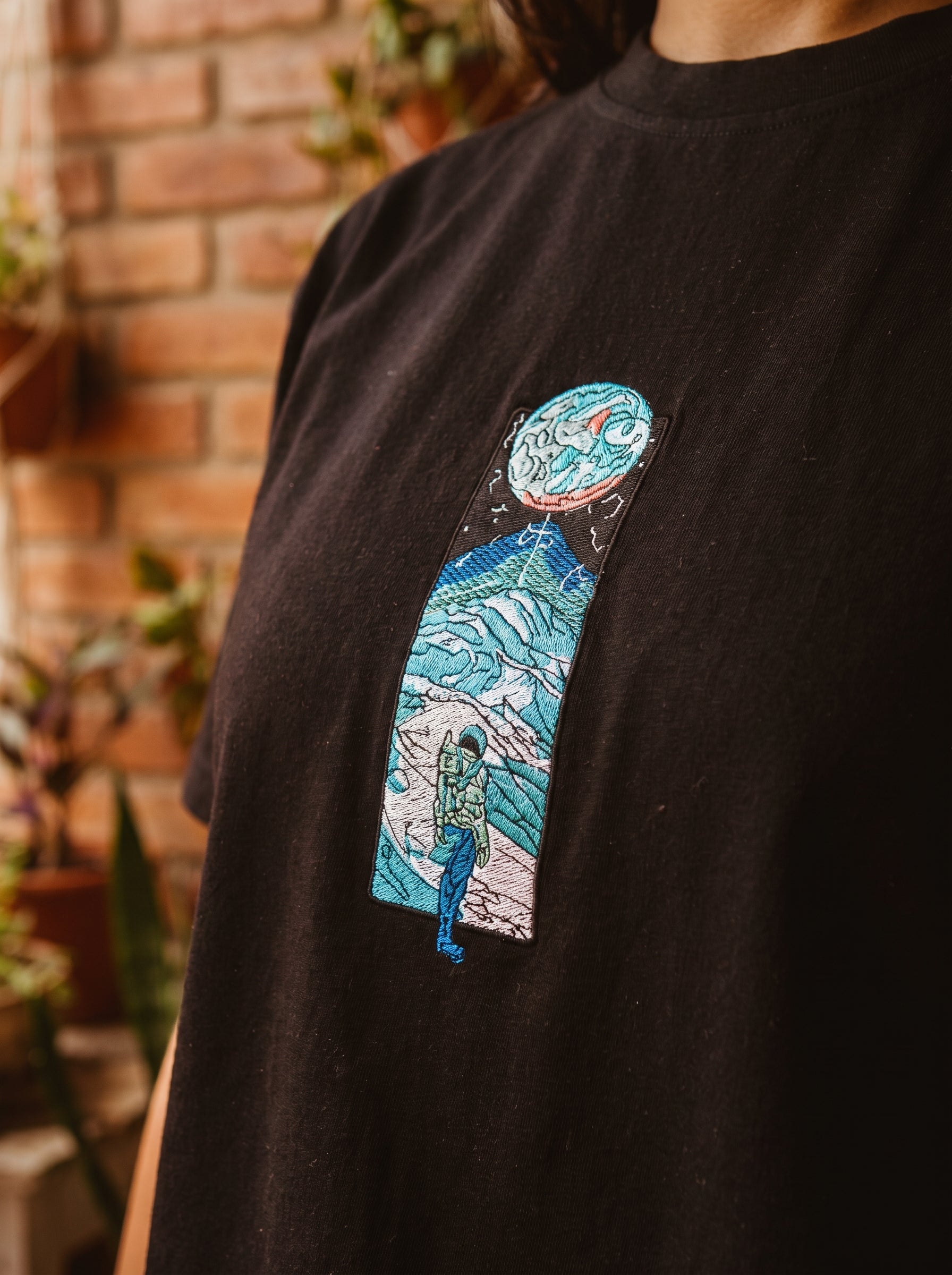 Beyond the Horizon – Astronaut Embroidered T-Shirt